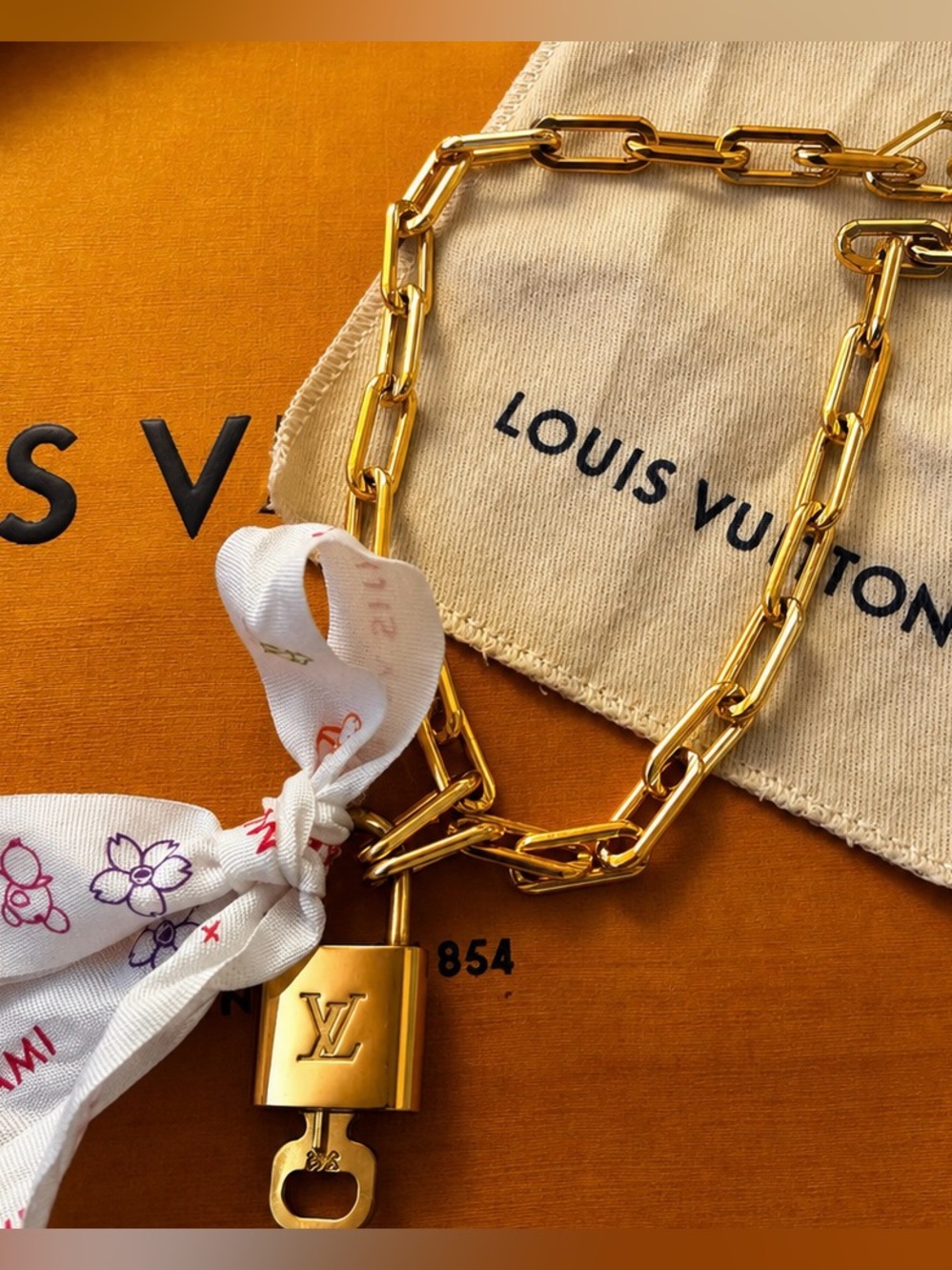 LOUIS VUITTON LOCK NECKLACE GOLD